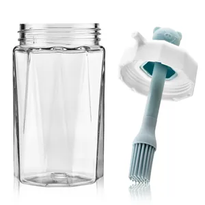 Clear glass oil dispenser bottle with integrated silicone brush and cute pig lid