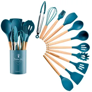 Detailed view of 11-piece blue silicone kitchen utensil set with wooden handles
