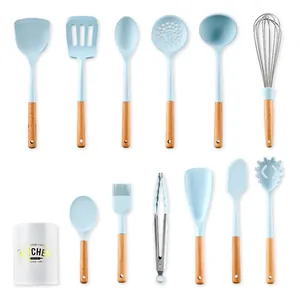 12-piece light blue silicone kitchen utensil set with wooden handles and storage bucket
