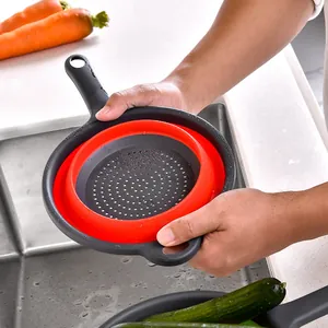 Portable red and grey collapsible kitchen colander for washing fruits and vegetables