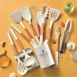 12-piece cream white silicone kitchen utensil set with wooden handles and storage bucket organizer