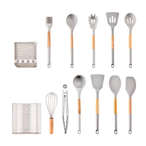 12-piece grey silicone kitchen utensil set with wooden handles and storage bucket