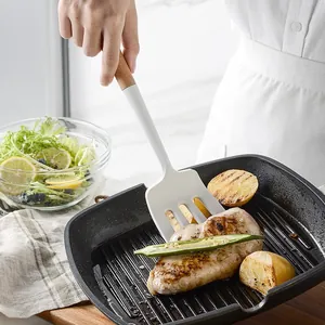 Cream white silicone slotted turner with short wooden handle for non-stick pans