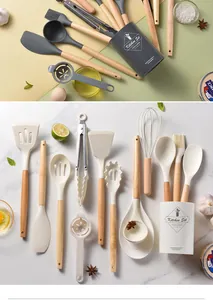 Detailed view of cream and grey silicone kitchen utensils with natural wooden handles