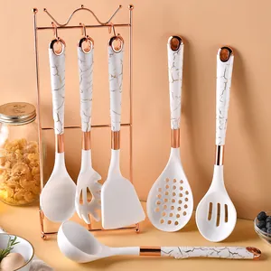 7-piece luxury silicone kitchen utensil set with marble pattern handles and rose gold rack