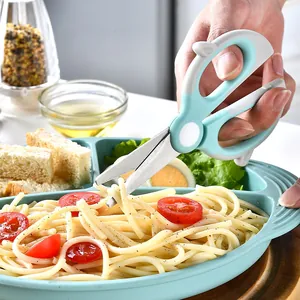 Portable baby food scissors cutting noodles in a bowl, light blue non-slip handle