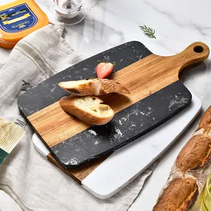 Elegant marble and acacia wood spliced cutting board for cheese and bread serving