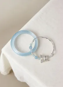 Exquisite light blue cat-eye stone bangle and silver butterfly charm bracelet stacking set