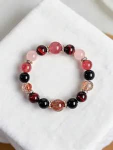 Exquisita pulsera de cuentas de piedras naturales multicolor con espaciadores dorados