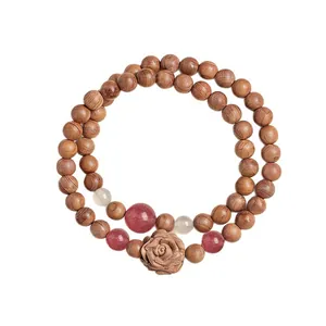 Double-layered natural cedarwood beaded bracelet with strawberry quartz and wooden rose