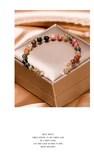 Detail of multi-colored tourmaline crystal bracelet with 14K gold magnetic clasp.