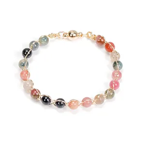 Colorful tourmaline gemstone bead bracelet with 14K gold wire wrap and magnetic clasp