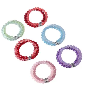 Collection of colorful natural crystal beaded necklaces and bracelets in various gemstone hues