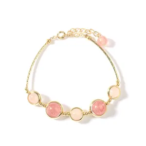 Elegant 14k gold filled bracelet featuring pink and strawberry quartz beads.