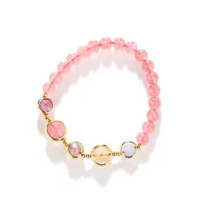 Elegant strawberry quartz beaded bracelet with 14k gold-filled accents for women.