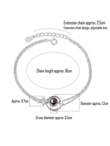 Silver plated projection bracelet featuring star charm with adjustable extension chain details