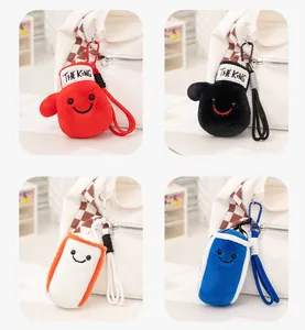 Four color variants of boxing glove and sandbag plush charms on white bags