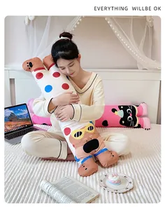 Cozy long dopamine cat plush pillow for side sleeping in a warm bedroom setting.