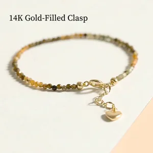 Fine 2mm yellow tourmaline beaded bracelet with 14K gold filled heart charm clasp