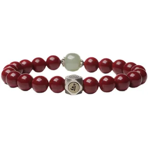 Red cinnabar bead bracelet with green Hetian jade and silver charm for good luck