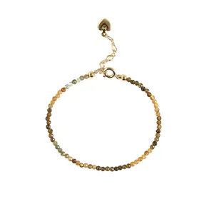 Elegant 2mm yellow tourmaline bead bracelet featuring a polished gold heart charm