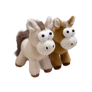 Funny pair of plush horse toys with large googly eyes and wide grins on white background
