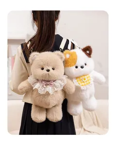 Close-up view of adorable brown bear and calico cat plush animal backpacks for girls
