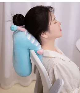 Close-up of a blue ice silk nap pillow used as a headrest on an office chair