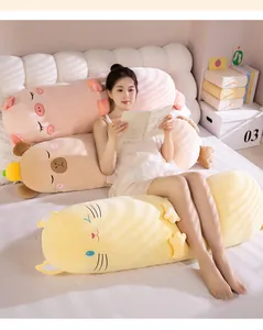 Detailed view of soft cartoon animal plush body pillows in a cozy bedroom setting