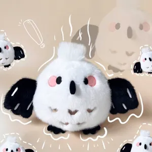 Adorable white milk ball bird plush toy with pink cheeks and black wings