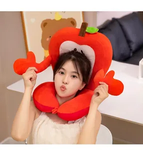 Cute apple shaped plush nap pillow shown on a model