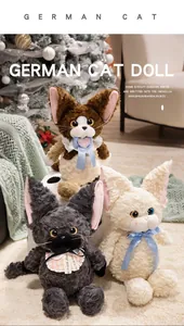 Süße Devon Rex Plüschkatzen mit lockigem Fell und Lätzchen in gemütlicher Umgebung