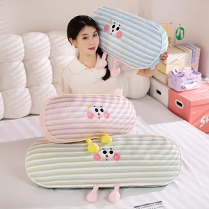 Detailed view of striped ice silk long body pillows with cute cartoon faces