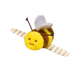 Peluche d'abeille mignonne pour enfants avec des ailes brillantes et un corps rayé jaune