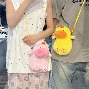 Detail shot of cute capybara and duck plush crossbody phone bags being worn by models