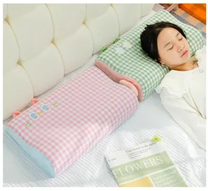 Soft waffle pattern memory foam pillow with a cute cartoon cat face design for children
