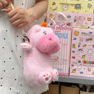 Cute pink plush hippo crossbody phone bag with soft fur and character design