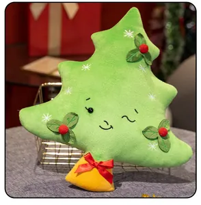 Cuscino di peluche albero di Natale con viso sorridente vischio e fiocco rosso decorativo