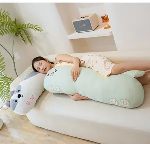 Close-up of girl sleeping with a large cartoon cat ice silk bolster pillow.
