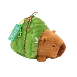 Cute capybara plush keychain toy wrapped in green zongzi leaf for Dragon Boat Festival