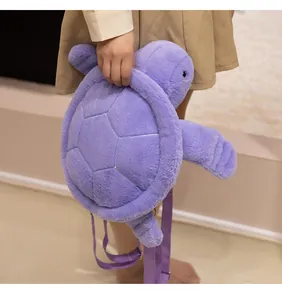 Detailed view of a soft purple turtle plush backpack with embroidered shell lines.