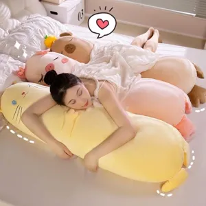 Cute cartoon animal long plush body pillow for sleeping shown on bed with model