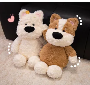Detailed view of two soft, fluffy plush dog dolls in white and brown puppy designs