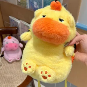 Close-up of a cute yellow plush capybara backpack with a funny expression