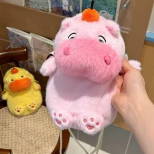 Detailed macro view of a soft pink capybara plush phone bag with a cute expression