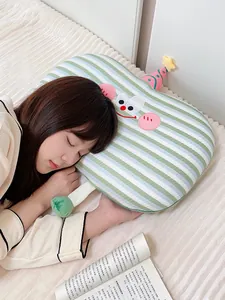 Cute cat-belly memory foam pillow with green stripes and model sleeping detail