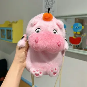 Detailed macro view of a cute pink capybara plush phone bag with a soft fuzzy texture