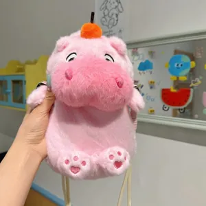 Close-up of cute pink plush capybara phone bag with soft embroidery details
