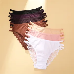 Détail de culottes en coton à taille basse pour femme avec dentelle fine et côtés à brides