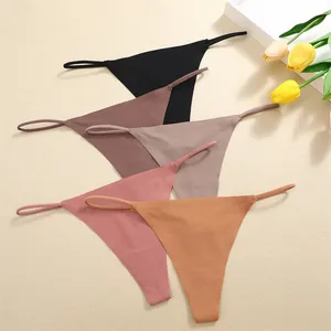 Seamless low-rise thong panties in a set of five neutral colors with thin straps
